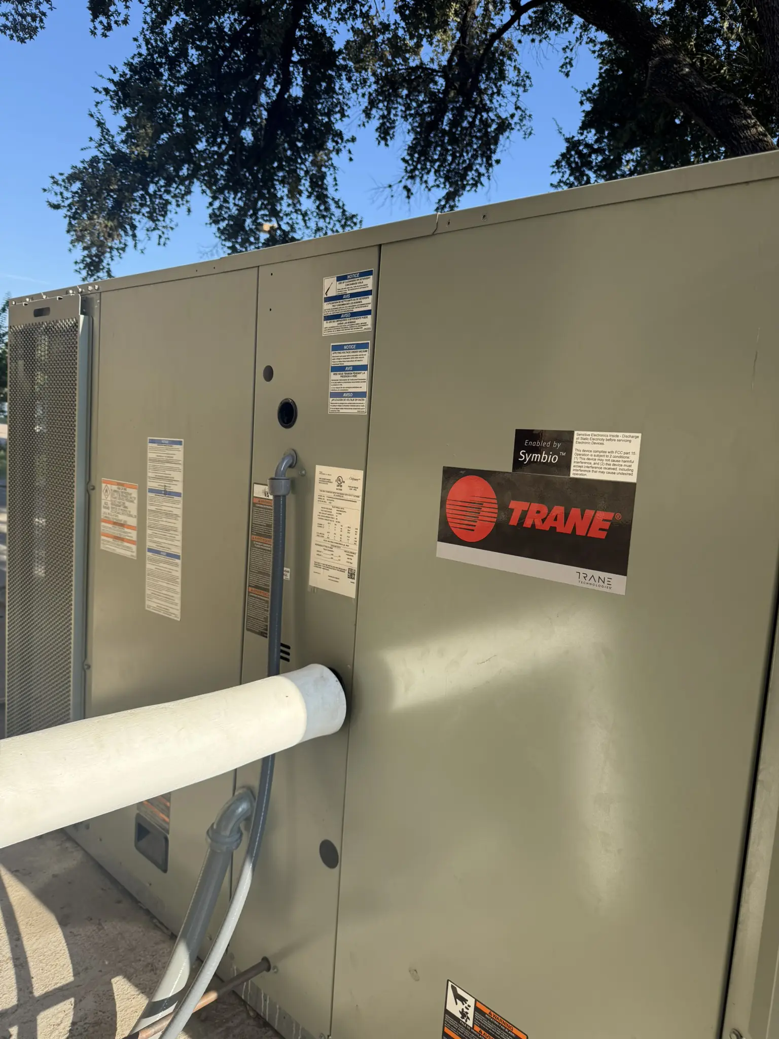 Industrial HVAC unit with Trane branding outdoors.